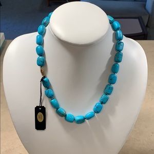 Simulated turquoise necklace with 14kt gold clasp.